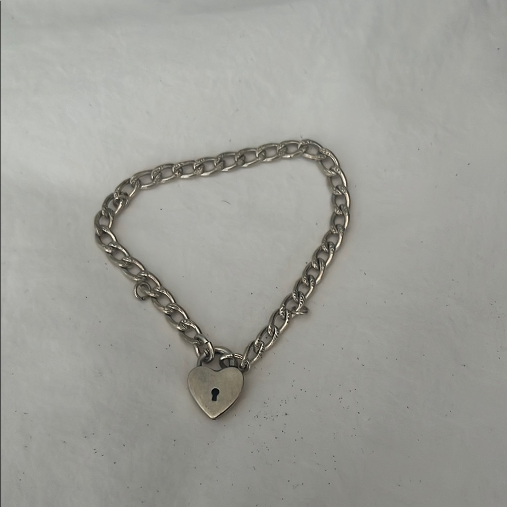 vintage silver bracelet with heart latch closure